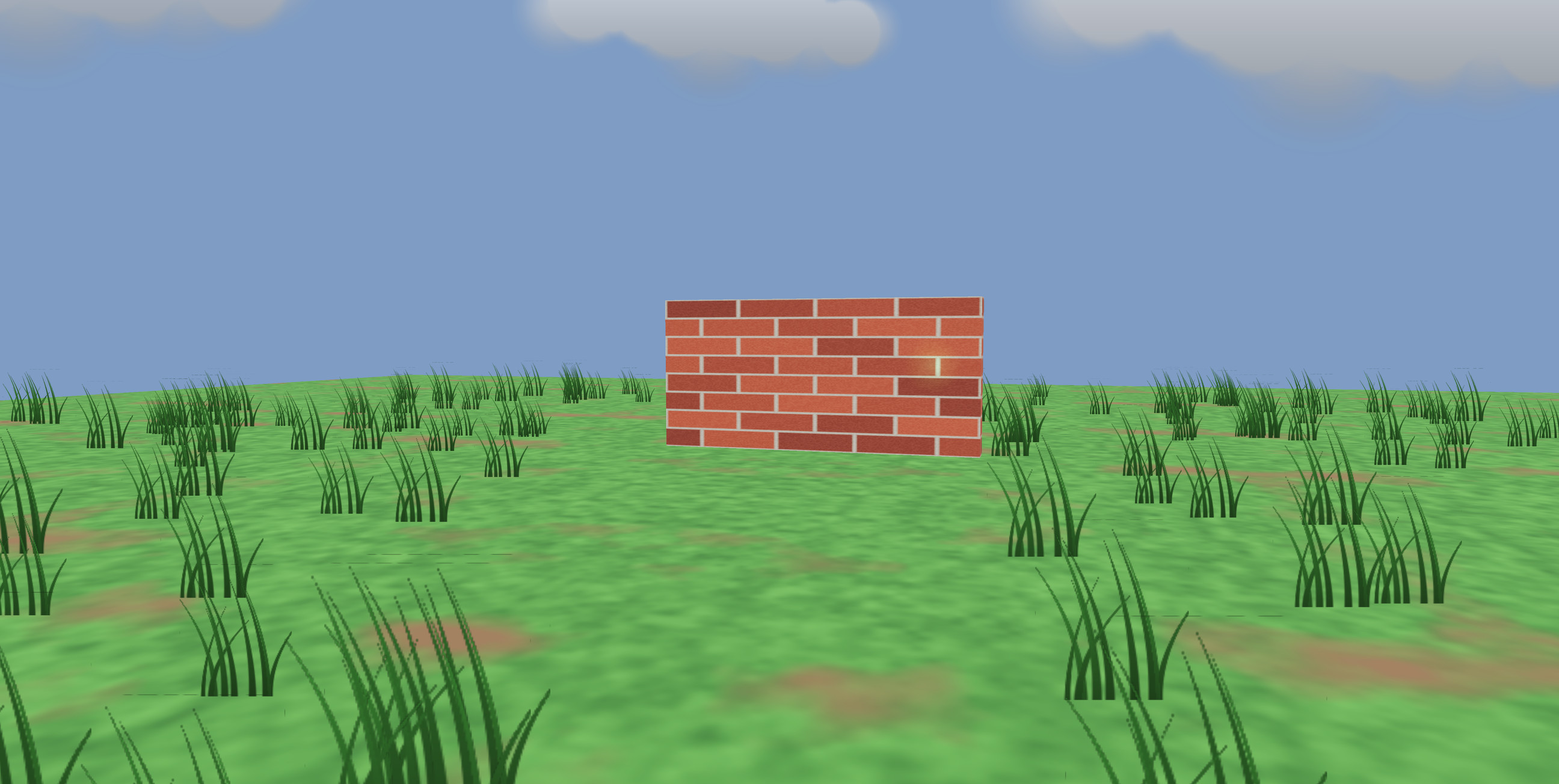 A field of grass under a cloudy sky with a brick wall standing in the middle of it.